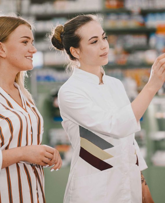medicine-pharmaceutics-health-care-people-concept-female-pharmacist-advises-buyer (1)_4_11zon medicine-pharmaceutics-health-care-people-concept-female-pharmacist-advises-buyer (1)_4_11zon